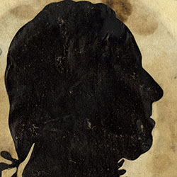 Profile of man's head facing to viewer's right. Ribbon holds back hair at neck and necktie bow visible below chin