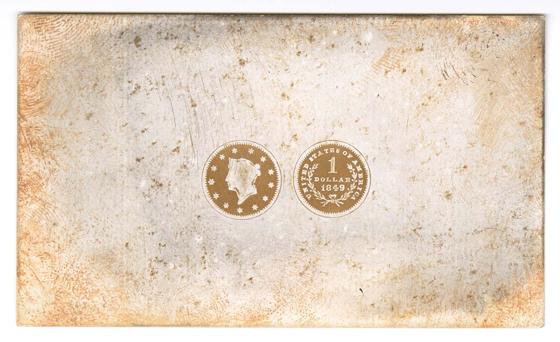 Die trial on card. Left circle contains profile of woman surrounded by thirteen stars. Right circle contains wreath and text.