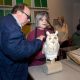 Reception, Common Touch: The Art of the Senses in the History of the Blind. Two visitors interact with a sculpture of an owl.