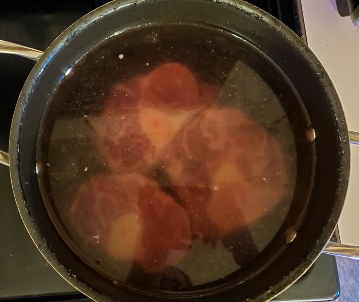 Beef shins in an 8 quart stockpot