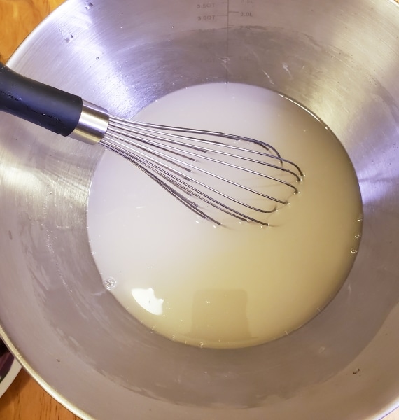 Dissolving sugar in water for fish house punch