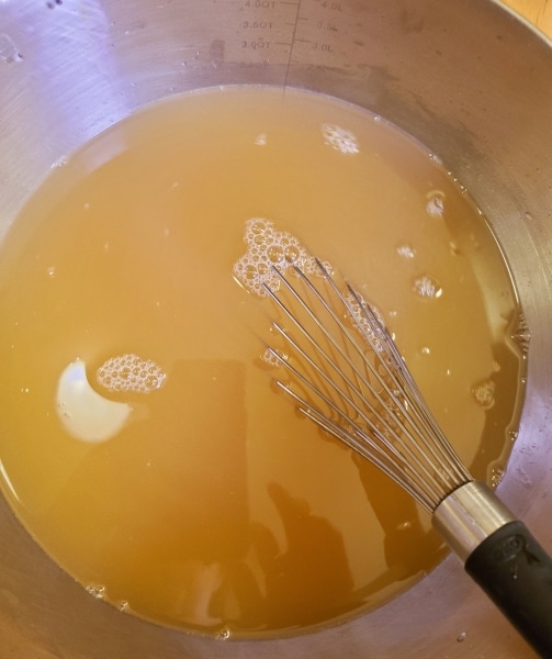 Adding water, to taste