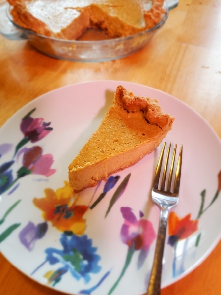 Pumpkin pie sliced and served Pumpkin pie sliced and served