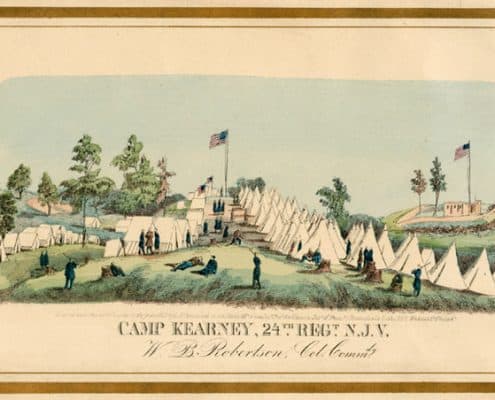 Rows of white tents surrounding American flags. Men in blue uniforms stand and lounge nearby.