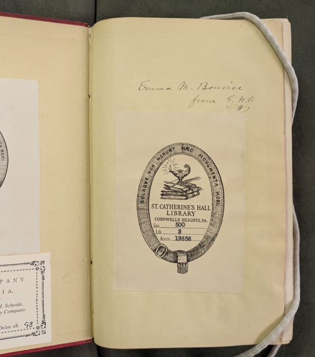 Photograph of inside flyleaf of book with Emma M Bouvier incscription