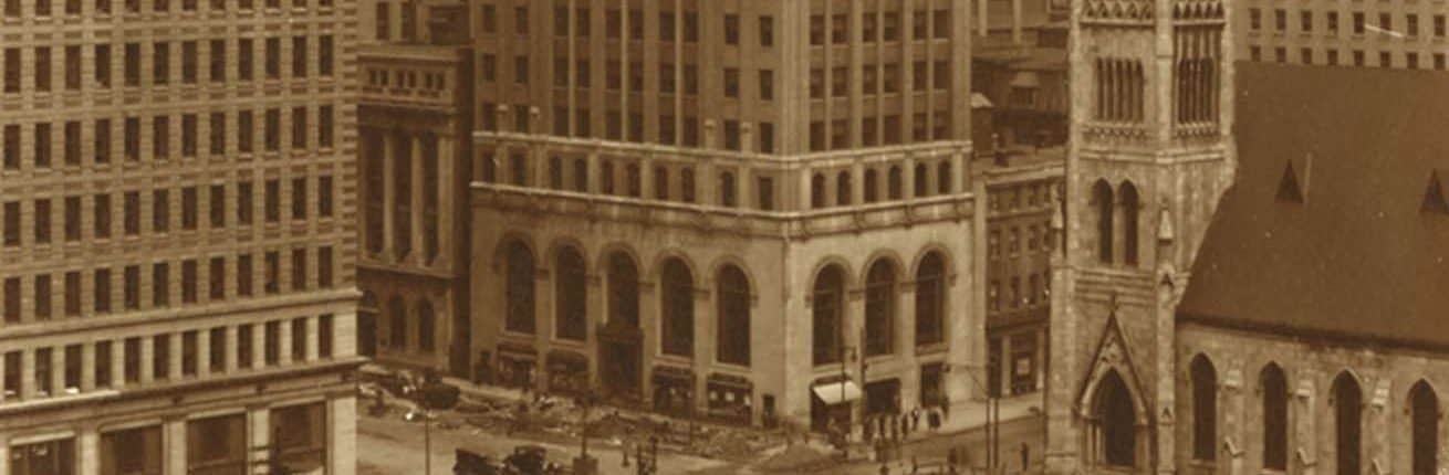 Detail of 19th-century photograph of Philadelphia buildings including a church and skyscrapers.