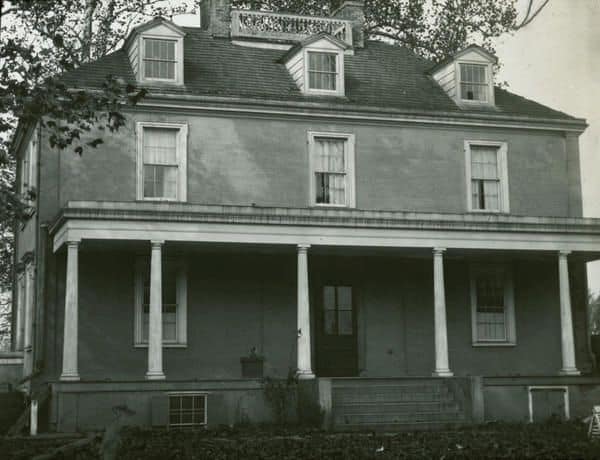 Black and white photograph of exterior of house