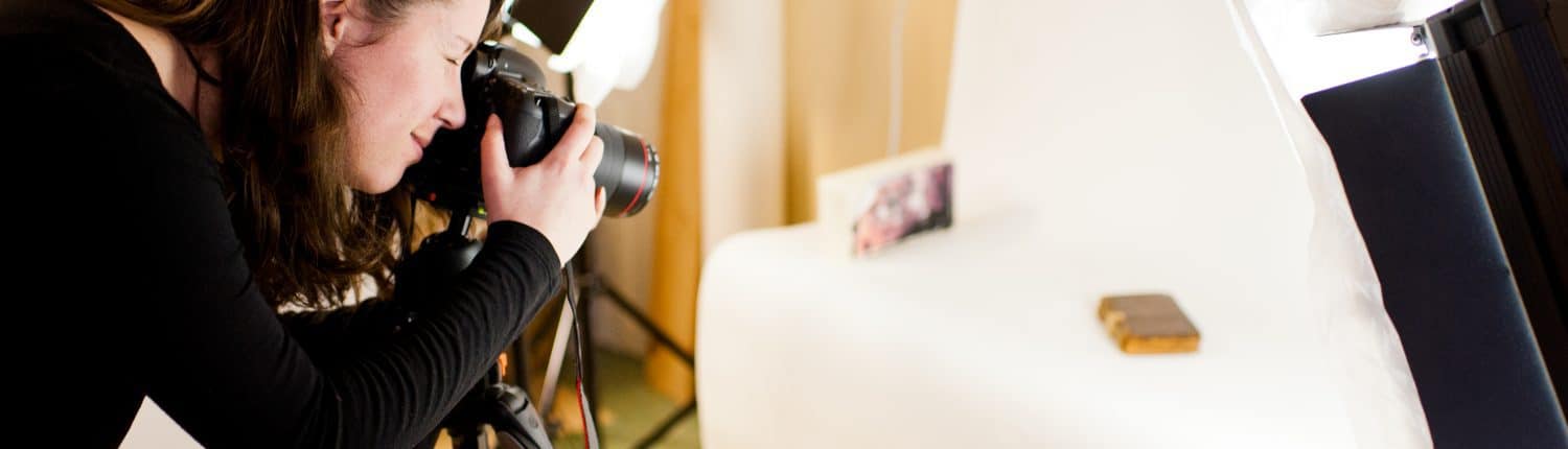 Concetta Barbera, Digital Outreach Librarian and Curatorial Assistant, taking a photograph of a book in the Library Company Digitization Department.