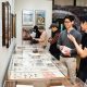 Visitors in the Louis Lux-Sions and Harry Sions Gallery at the Library Company of Philadelphia.