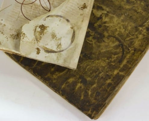 Book with ring-shaped stain.