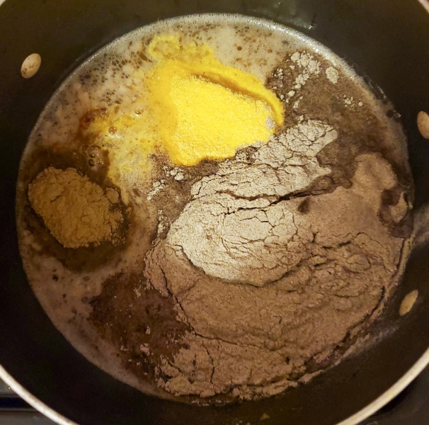 Dry ingredients, added to pork and broth