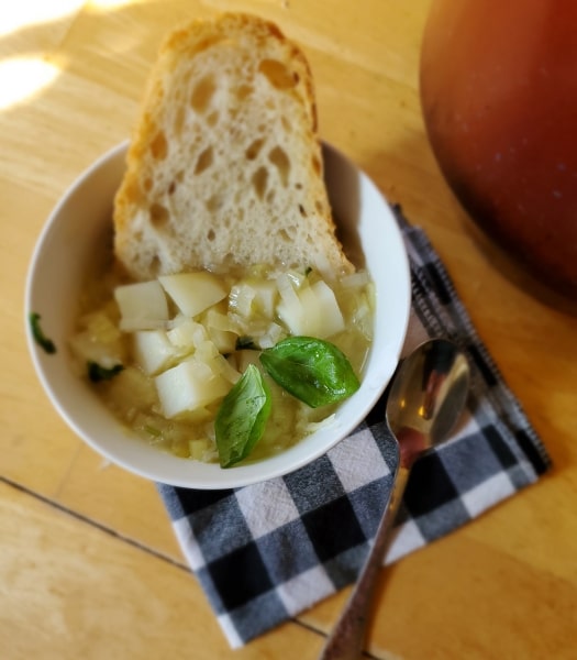 Leek Soup served with fresh crusty bread and basil.