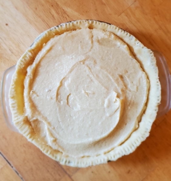 Filling added to crust and ready to bake