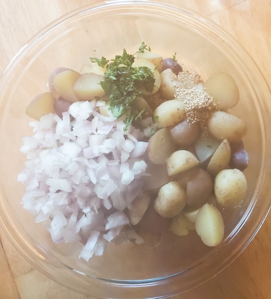 Steamy salad from hot potatoes