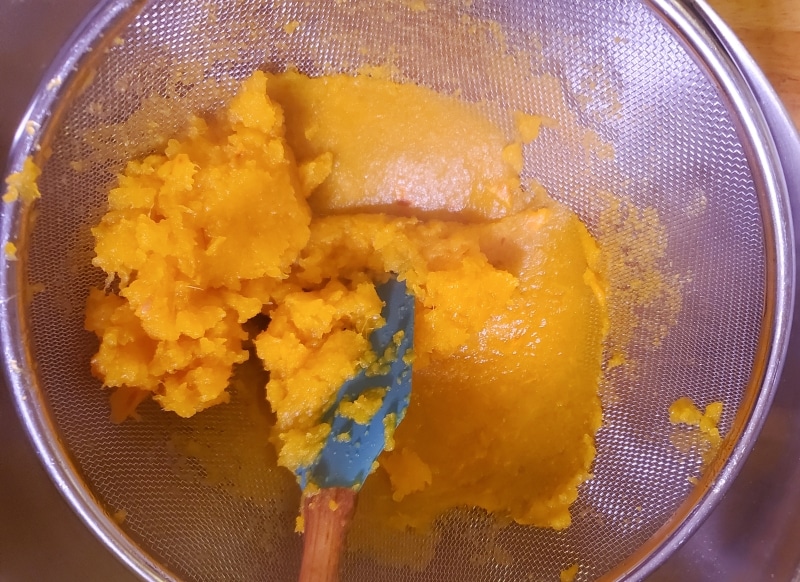 Straining the boiled pumpkin
