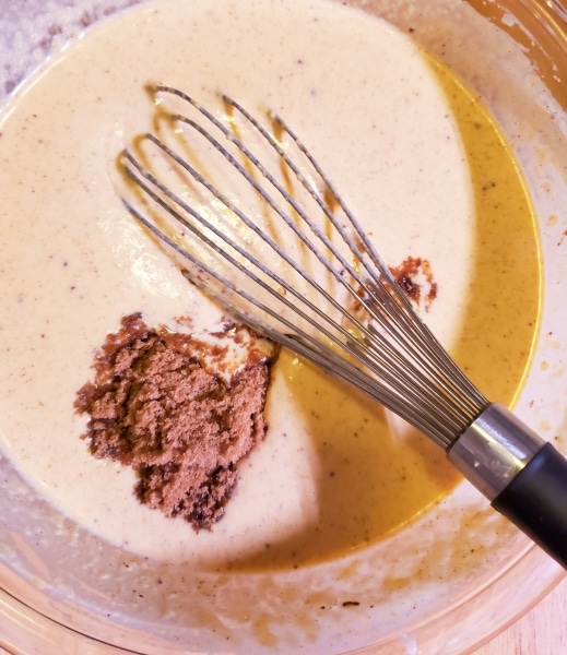 Adding brown sugar to the pie filling mix Adding brown sugar to the pie filling mix