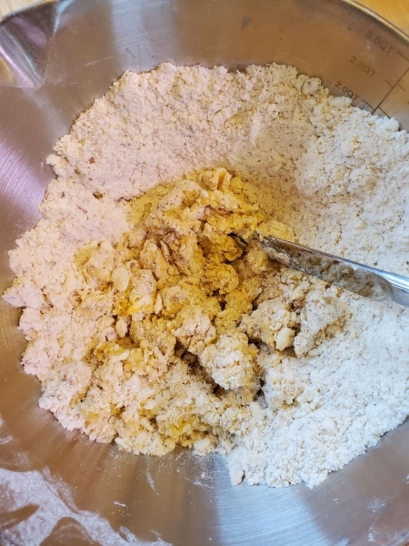 Rum/brandy added to the egg yolk