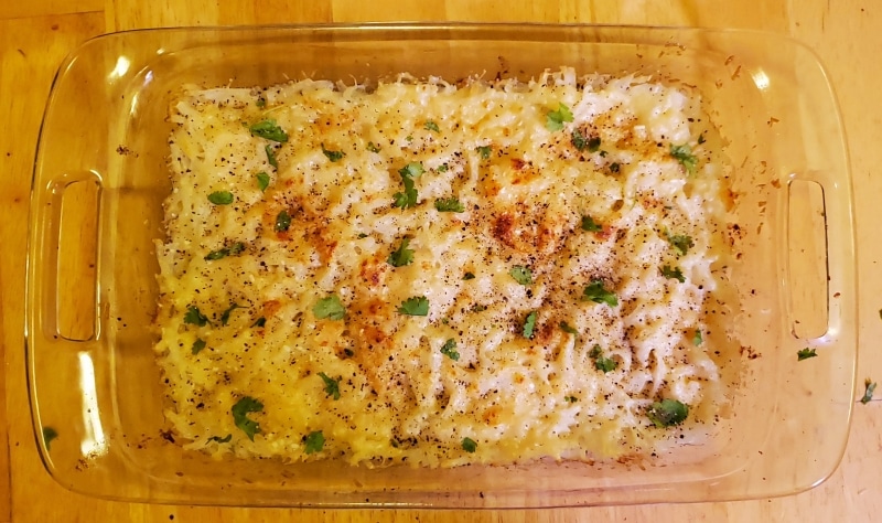 Vermicelli and cheese topped with fresh herbs